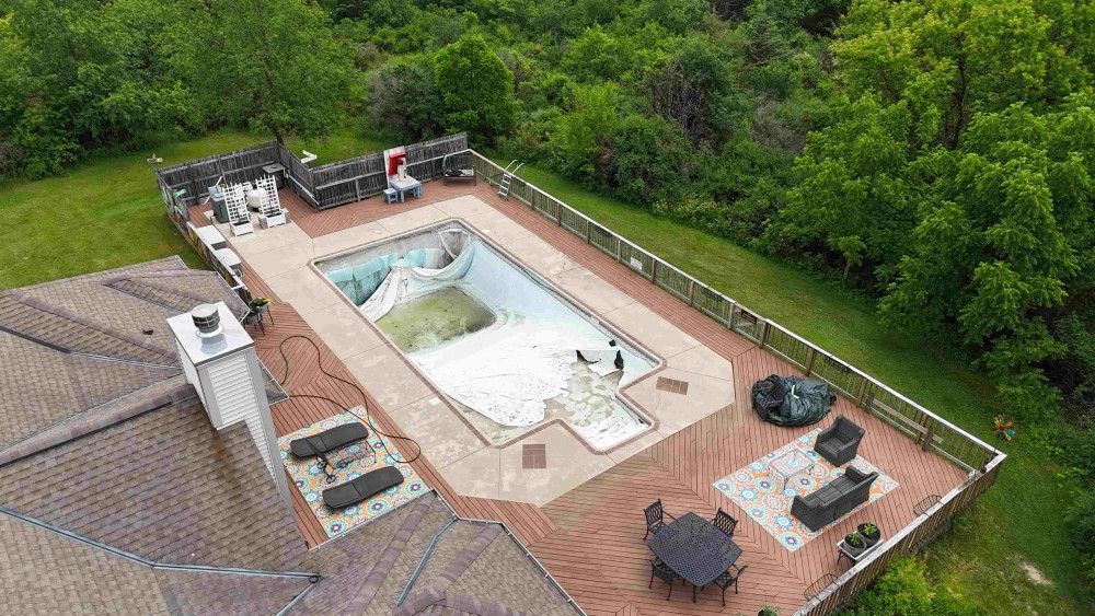 Vinyl Liner Replacement in East Troy WI - Before, Torn Liner