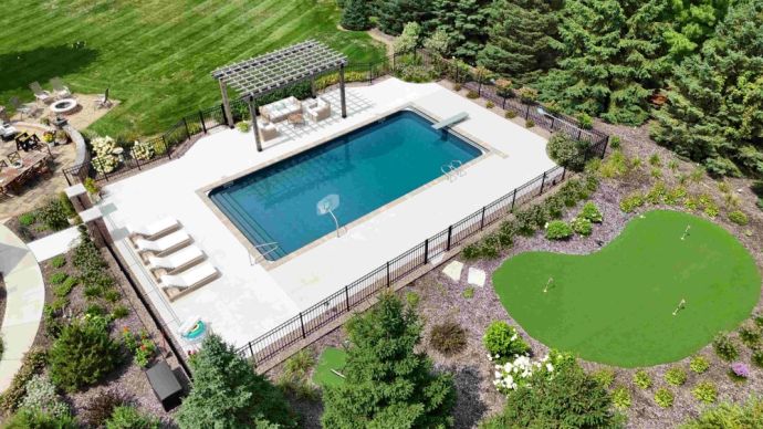 inground vinyl liner swimming pool in Waukesha Wisconsin with putting green