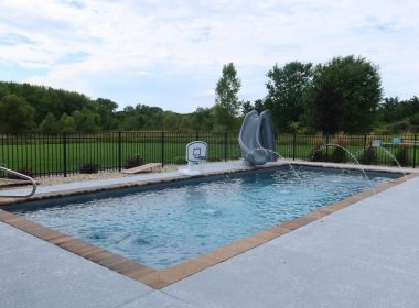 Barcelona Fiberglass Pool with Stone Coping and Deck Jets in Franksville WI 