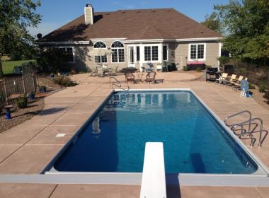 inground pool with diving board