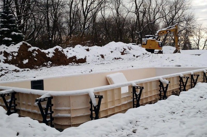 Pool being built during winter season